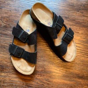 Black suede Birkenstock’s